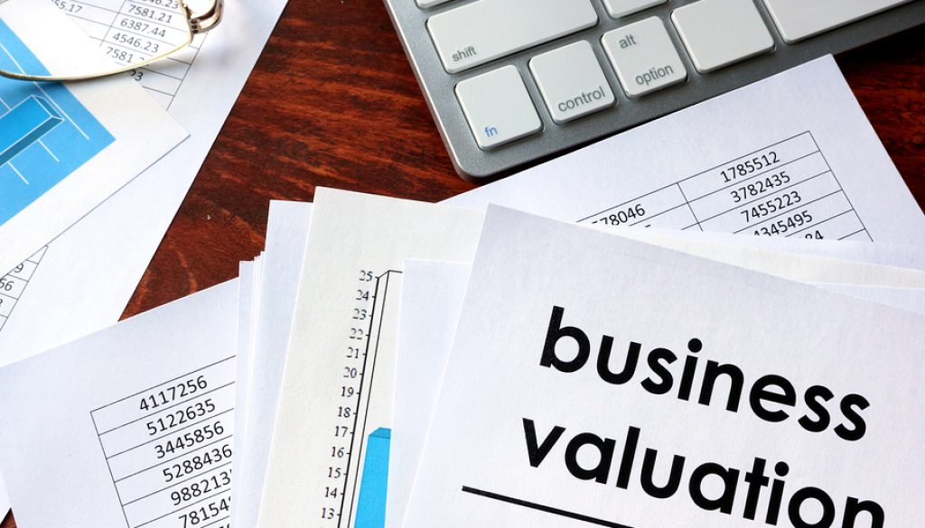 Business valuation written in a document business charts.